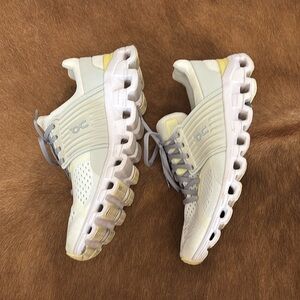 On Running White and Gray Athletic Shoes with Cushioned Soles